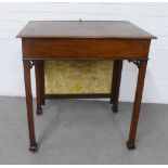 19th century mahogany table with a rising embroidered screen above a rectangular top with a drawer