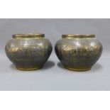 Pair of Middle Eastern brass and mixed metal inlaid bowls, circa early 20th century, 24cm (2)