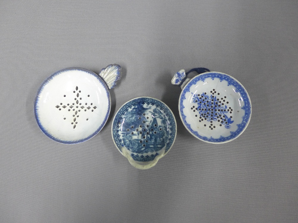 Three English 18th century blue and white strainers to include Fisherman and Cormorant pattern and