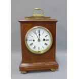 Mahogany cased mantle clock, with brass movement numbered 1488, striking on a gong, 40cm including