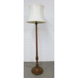 Mahogany standard lamp of fluted design, on a circular base , 188cm high including shade