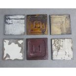 Collection of six contemporary pressed metal wall art panels, each of square form, 29 x 29cm (6)