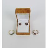 Two 9ct gold gemset rings and a pair of 9ct gold flowerhead earrings (3)