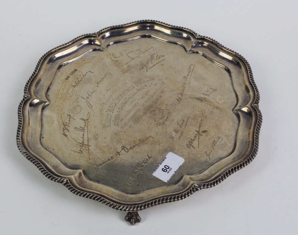 George V silver presentation tray with a gadrooned pie crust rim, inscription to centre within a