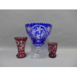 Large Bohemian blue flashed glass goblet on a pedestal base together with two Wittig Crystal red