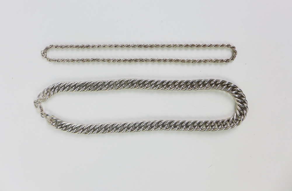 Silver curb link necklace, approx 125g together with a silver rope twist necklace (2)