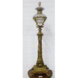 Brass oil lamp with a glass well, converted for use as an electric lamp, 80cm excluding fitting