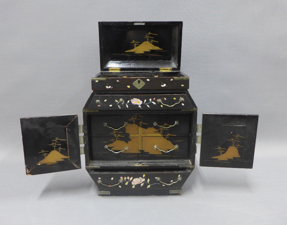 Japanese lacquered jewellery box with a hinged lid over a single long drawer and pair of cupboard - Image 2 of 4