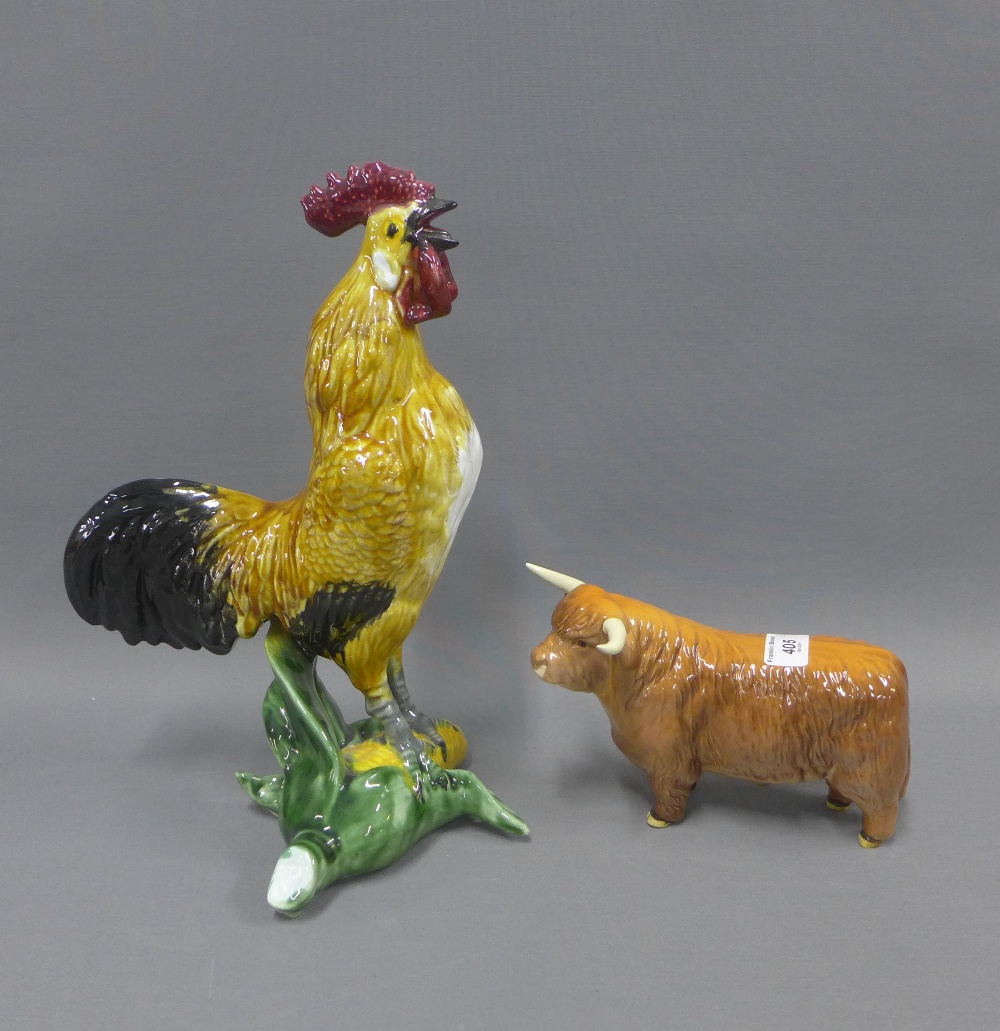 Continental pottery Cockerel, 24cm, and a Beswick highland cow, (a/f)