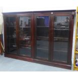 A pair of mahogany glazed bookcases (tops have been cut to allow the bookcases to sit by side)