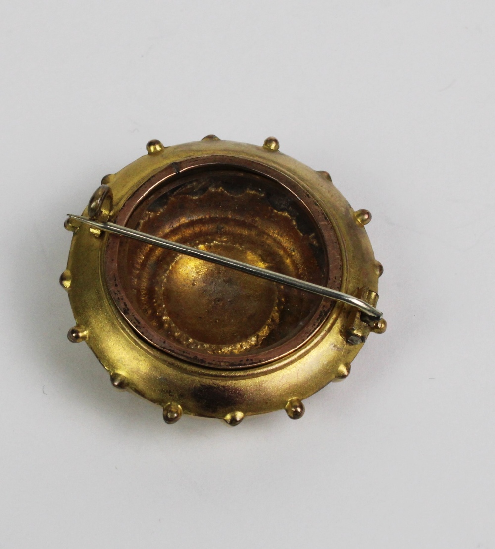 Victorian yellow metal brooch, set with a single old cut diamond and with a glazed locket panel to - Image 2 of 2
