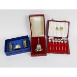 Silver bell with filigree handle, London 1987, boxed together with a three piece silver condiments