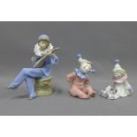 Lladro porcelain clown and two Nao clowns, tallest, 18cm, two with original boxes, (3)