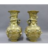 Pair of Chinese brass vases applied with dragon and pearl of wisdom pattern, the base with character