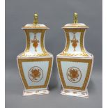 A pair of Vista Alegre porcelain vases and covers, with gilt dog finials, (2)