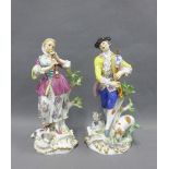 A pair of Meissen porcelain Shepherd and Shepherdess porcelain figures, the male figure with