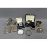 Mixed lot of silver items to include two cigarette cases, silver topped glass jar, cruets,