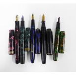 Five early 20th century fountain pens to include Conway Stewart, Wyvern and Platignum, etc, some