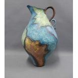 Large contemporary studio pottery jug, painted with leaves, wooden base included, 53cm high