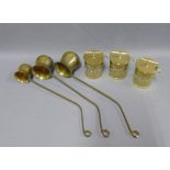 Brass brandy ladles and a set of brass tea, coffee and sugar canisters, (a lot)
