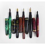 Five early 20th century fountain pens to include Conway Stewart, Wyvern and 'chancellor', etc,