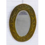 Arts & Crafts style brass wall mirror with oval bevelled glass plate, 61 x 41cm