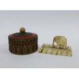 Early 20th century ivory elephant plaque and a small brass mounted porcelain box, 7cm (2)