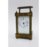 Edwardian brass carriage clock with decorative case and French movement, 15.5cm including handle