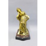 Art Nouveau style brass and faux ivory seated figure, 24cm