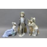 Two Lladro figures and Nao figure, tallest 26cm (3)