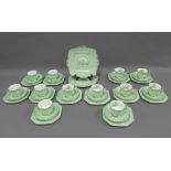 Paragon 12 place china teaset, with waterlily pattern and green mottled ground, printed factory