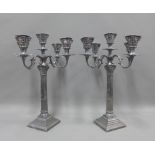 A pair of silver plated five branch candelabra, (2)