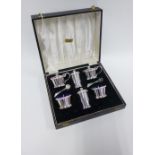 George VI silver condiment set comprising a pair of salts, pair of pepper pots and a pair of