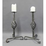 Pair of iron candle sticks with spiral stems and tripod legs, 43cm (2)