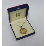 Royal Mint Sovereign limited edition pendant in a 9ct gold frame with diamonds, on a 9ct gold chain