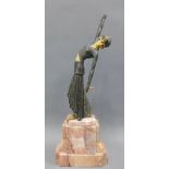 A reproduction art deco figure on a stepped hardstone base, (a/f with losses)