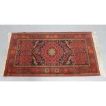 Louis de Poortere Mossoul wool rug with red field, 165 x 86cm.