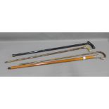 Four various walking canes, some with silver mounts and one with a horn handle, (4)