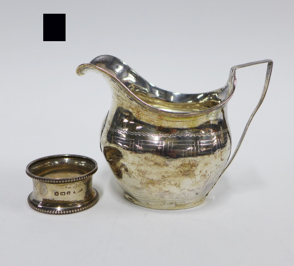 Georgian silver cream jug, London circa 1806, hallmarks partially rubbed, 9cm, and a Birmingham