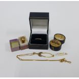 Two 9ct gold gemset rings and a 9ct gold wedding band together with a 14ct gold pendant necklace and