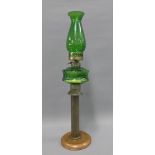 Copper and green glass oil lamp, 57cm