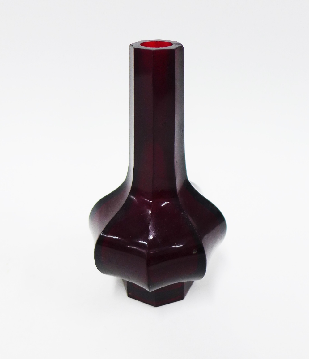 Chinese faceted ruby red glass bottle vase, with bulbous body and slim neck, with an etched Qianlong
