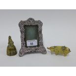 Sheffield silver photograph frame, 10 x 13cm, small brass Mr Punch bell and a tin plate pig, (3)