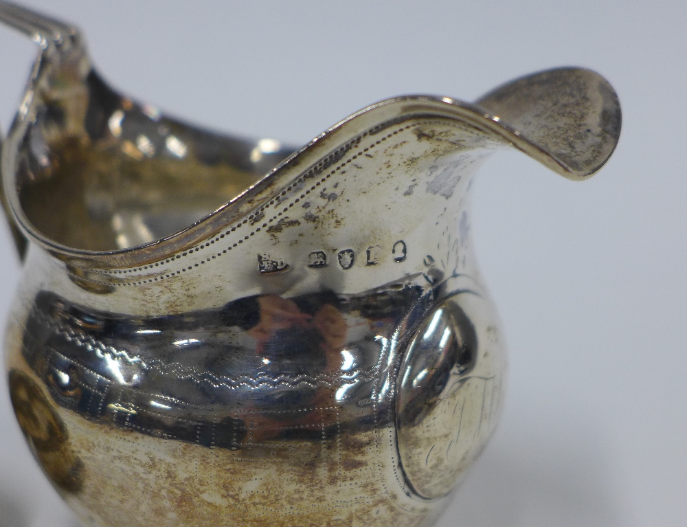 Georgian silver cream jug, London circa 1806, hallmarks partially rubbed, 9cm, and a Birmingham - Image 3 of 4