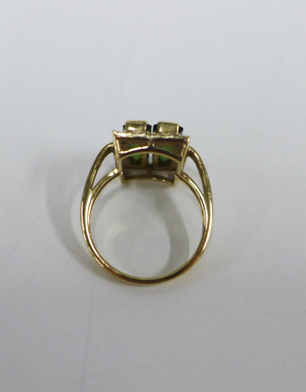 9ct gold dress ring with two emerald cut green stone within a surround of claw set diamonds - Image 3 of 4