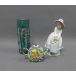 Mixed lot to include a lava vase, Lladro figure and a Trade Aid enamel teapot, (3)