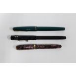 Vintage fountain pens to include Conway Stewart 84 with a gold nib, the 'Torpedo' and a Parker (3)