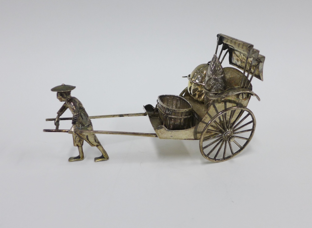 Luen-Wu, Shanghai, a Chinese silver rickshaw with cruets, stamped marks to base, 19cm long - Image 3 of 4