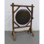 Bamboo floor standing gong, complete with beater, 74 x 102 x 39cm