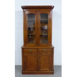 19th century mahogany bookcase cabinet, pediment top over a pair of glazed doors with a shelved